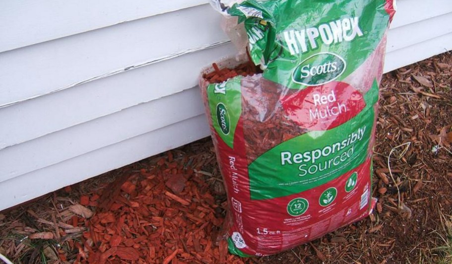 bag of mulch against a house