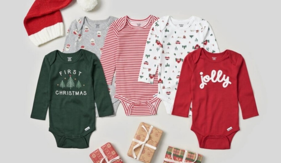 5 baby's holiday onesies inb different colors