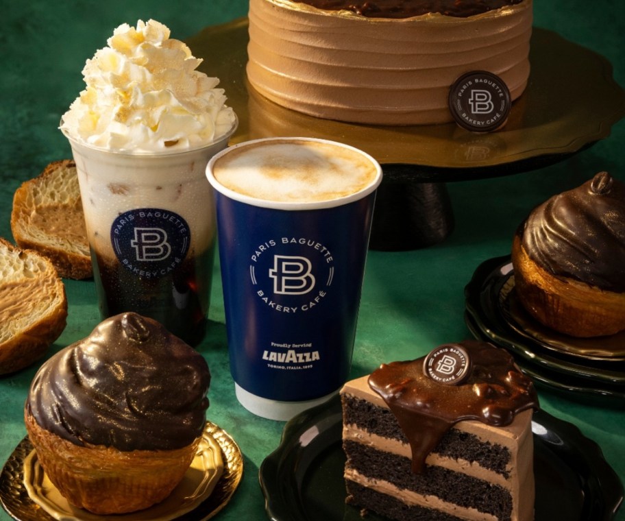 pastries and coffee drinks on a green tablecloth