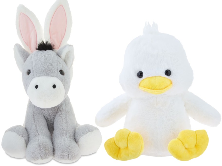 a plush donkey with rabbit ears and a plush duck