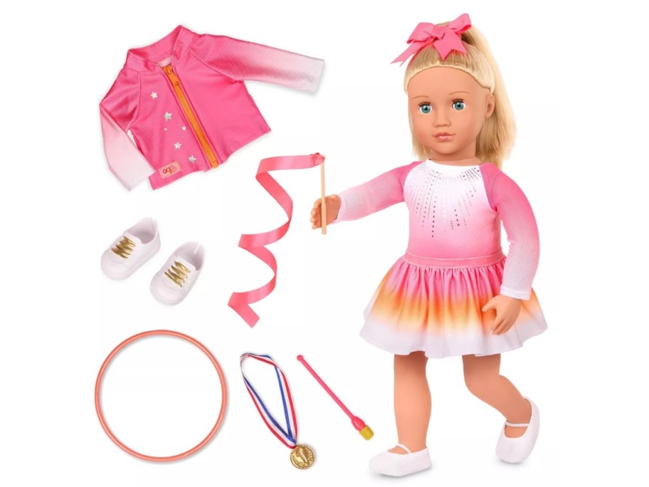 a doll with a gymnastics outfit on and gymnast accessories