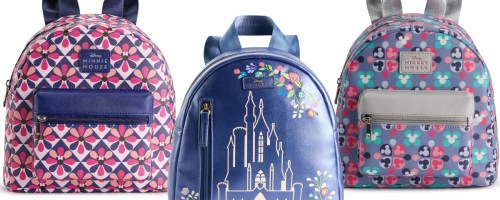 stock images of three disney backpacks in minnie mouse, a princess castle, and mickey mouse print