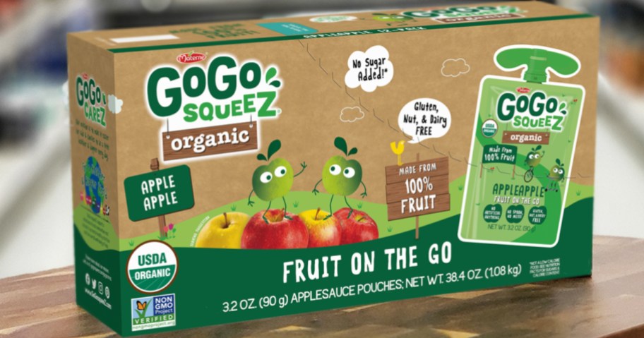 box of GoGo squeeZ Organic Applesauce Pouches on wood table