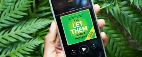 Person holding phone would let them audible book on screen