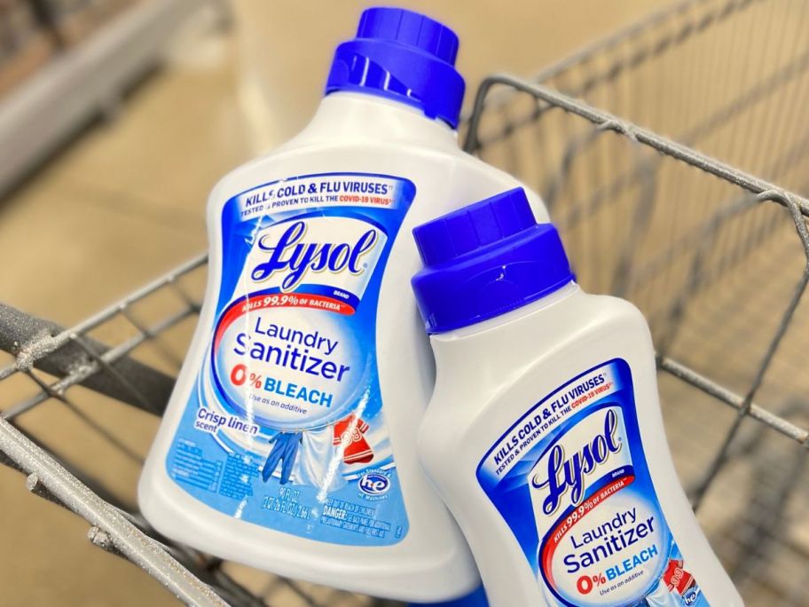 A large and small bottle of Lysol Laundry Sanitizer in a shopping cart