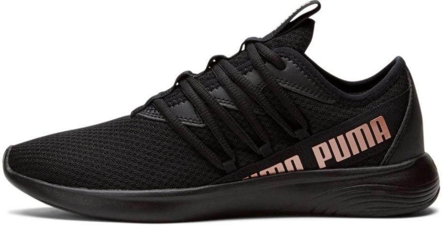 a womens black lace up running show with rose gold graphic