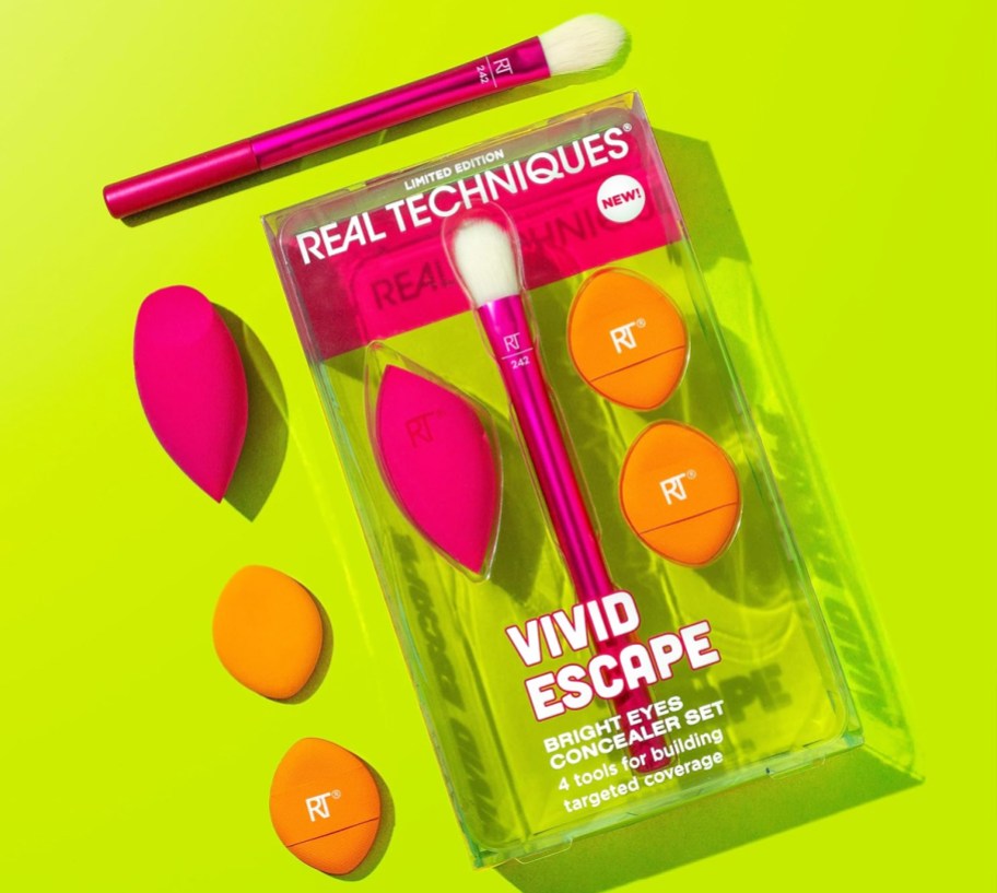 Real Techniques brush and sponge set on a neon green background