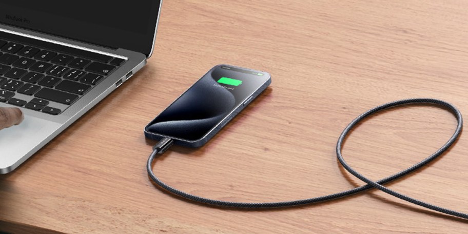 phone charing with cable on table