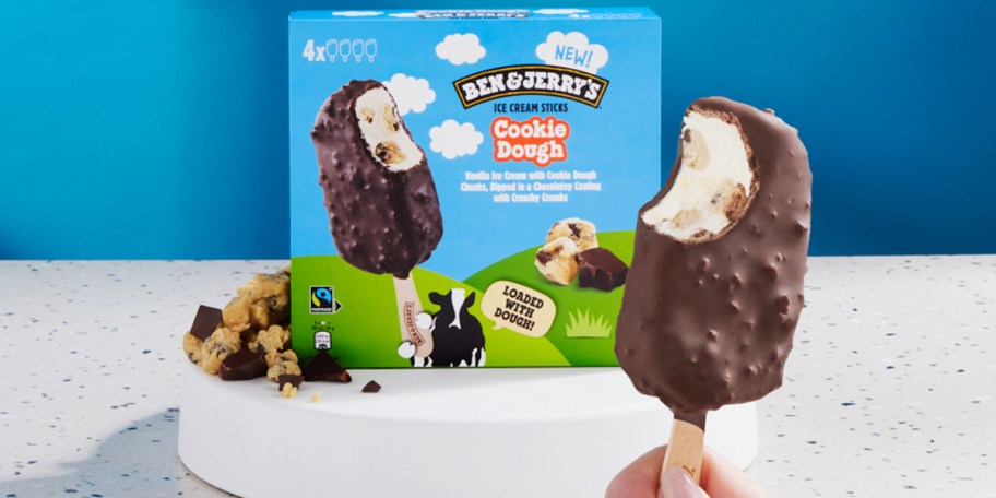 ben and jerrys ice cream bar box and hand holding bar