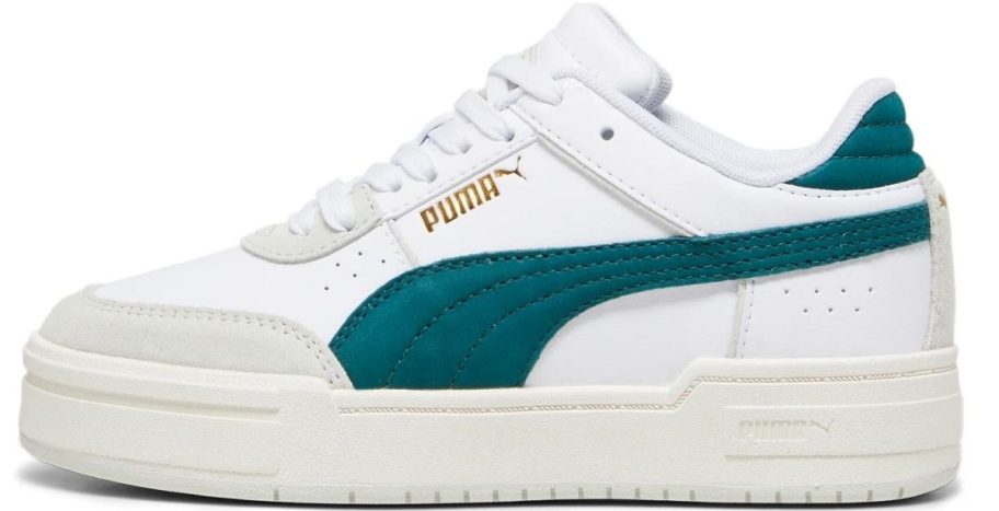 a leather kids sneaker in white with a green stripe down the side