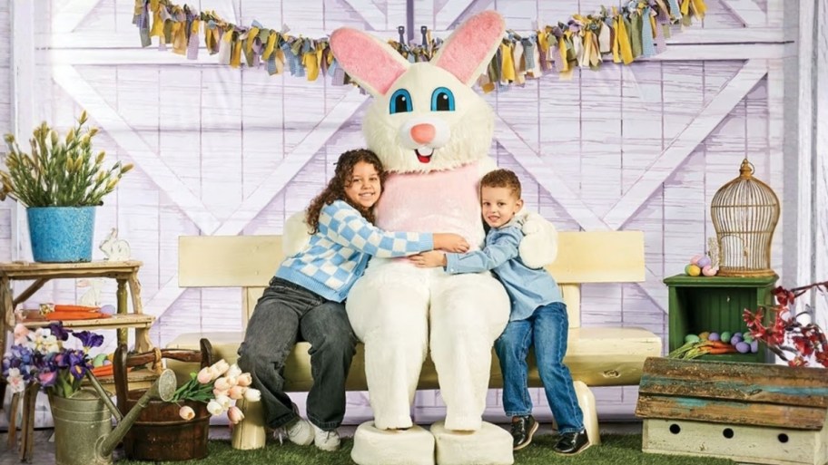 two kids in a picture with the easter bunny