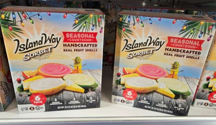 two boxes of fruit sorbets in a store freezer