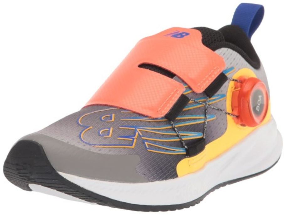 black, blue, and orange New Balance Kid's Fuelcore Reveal V3 Boa Running Shoe