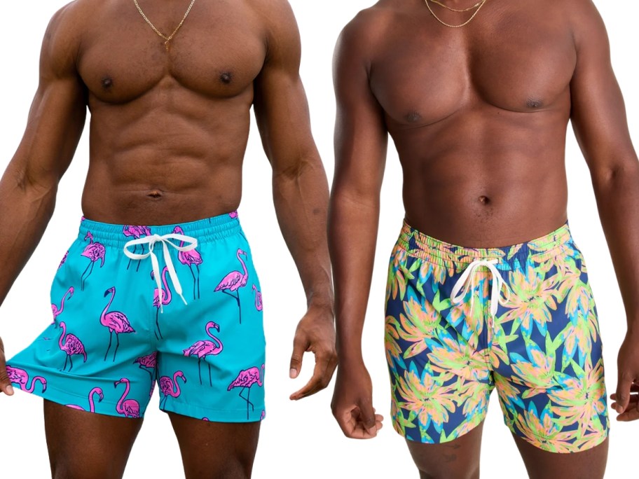 2 men wearing bright print swim trunks