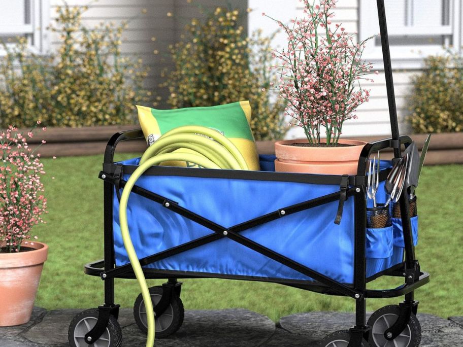 Amazon unity wagon filled with gardening items displayed in the yard