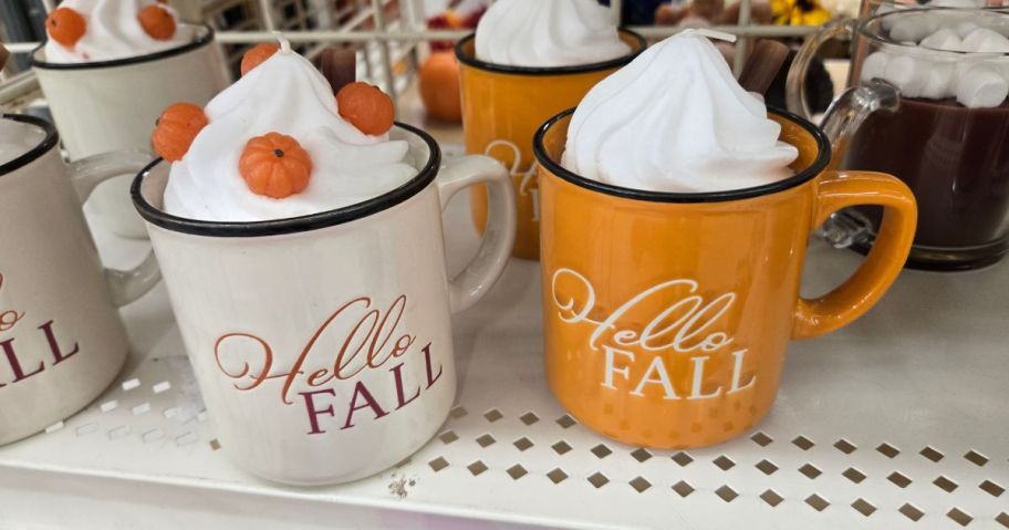 candles that look like mugs of coffee with a dollop of whipped cream on them