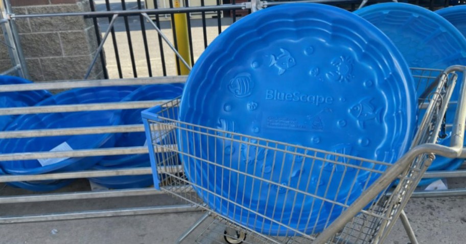 Blue plastic kids pool inside Walmart shopping cart