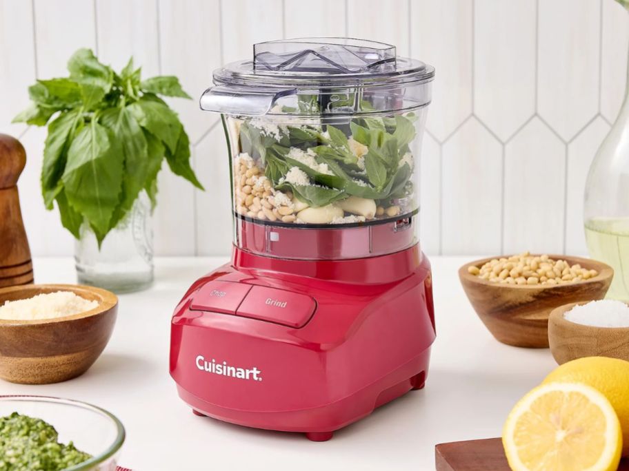 A red Cuisinart 3-Cup chopper on a counter
