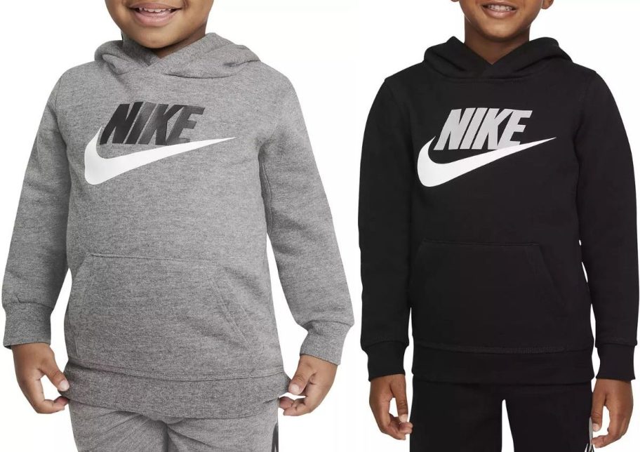 Stock images of little boys wearing Nike hoodies