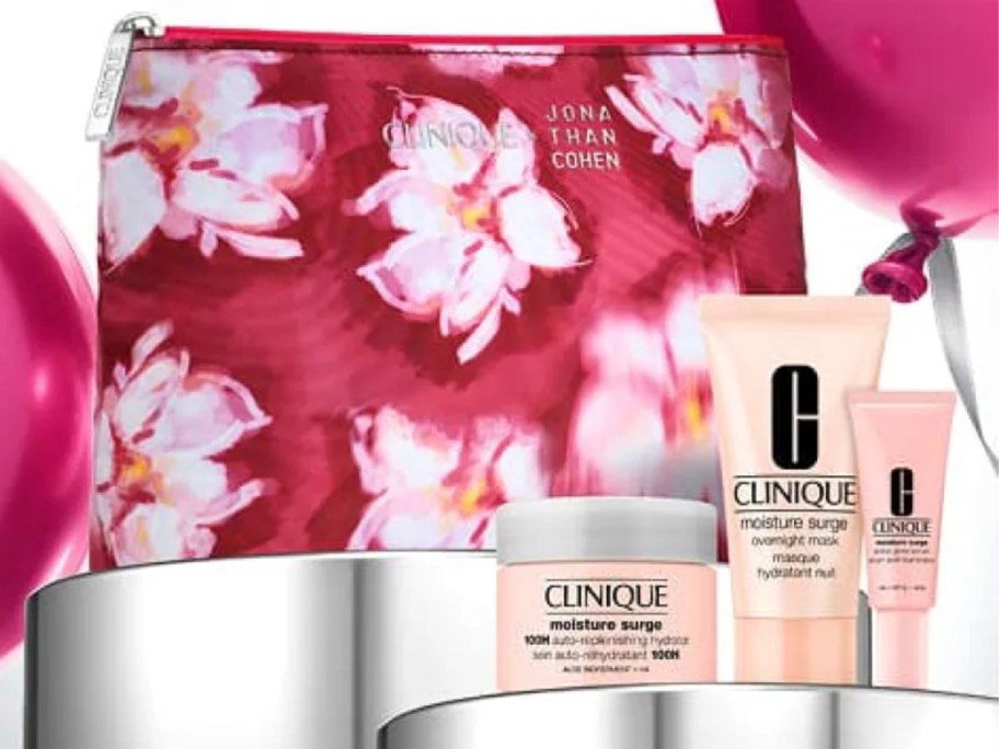 a Clinique skincare set with a pink floral cosmetic bag