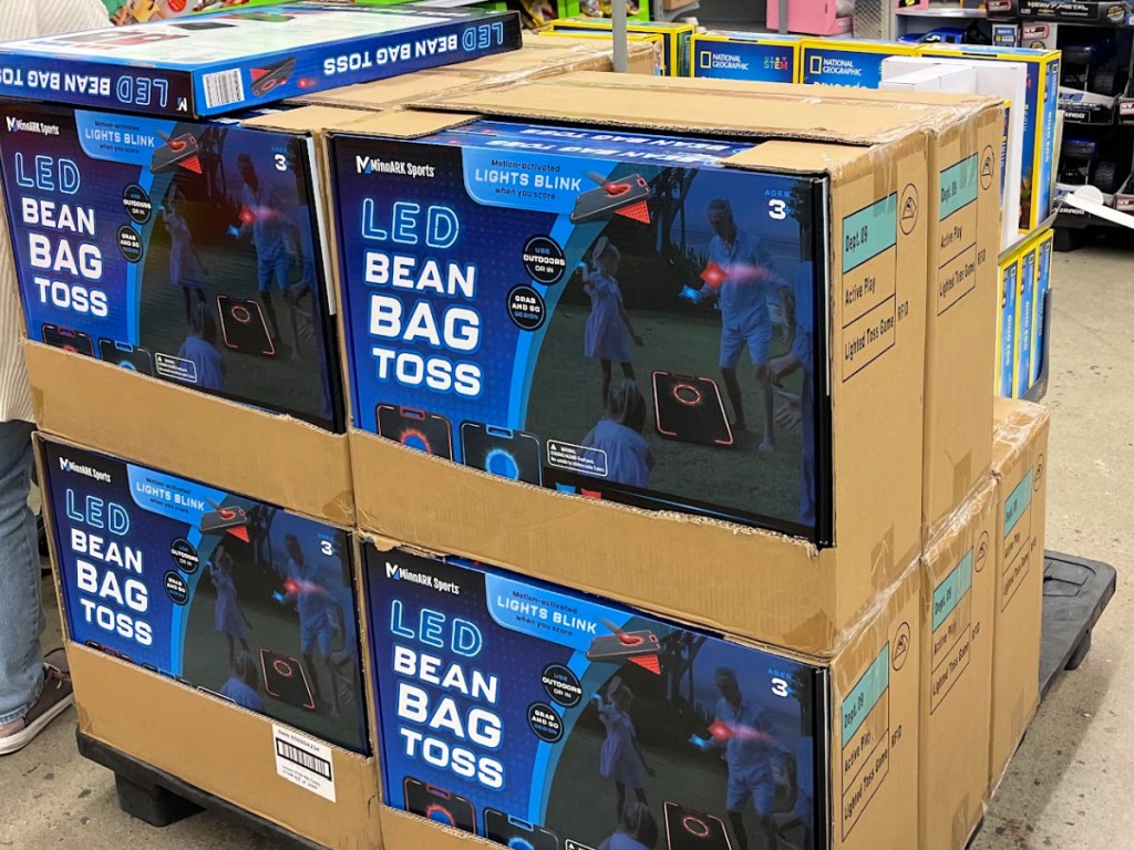 Boxes of LED cornhole sat on display inside Walmart store