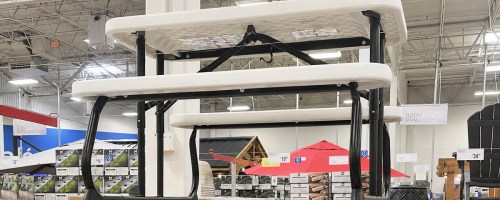 white and black picnic table on display in sam's club