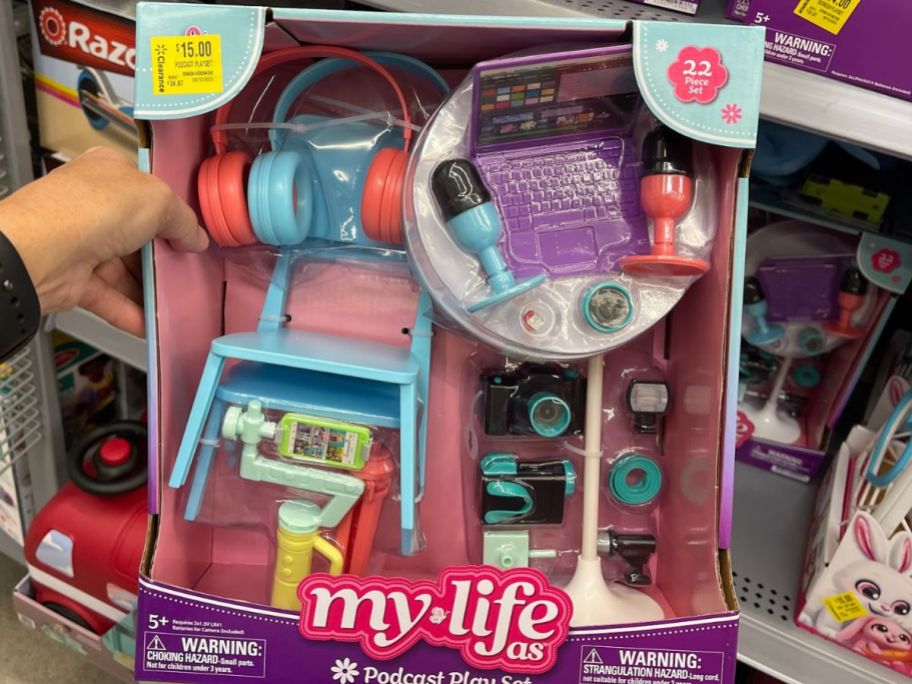 Hand holding a My Life As 22-Piece Podcast Playset