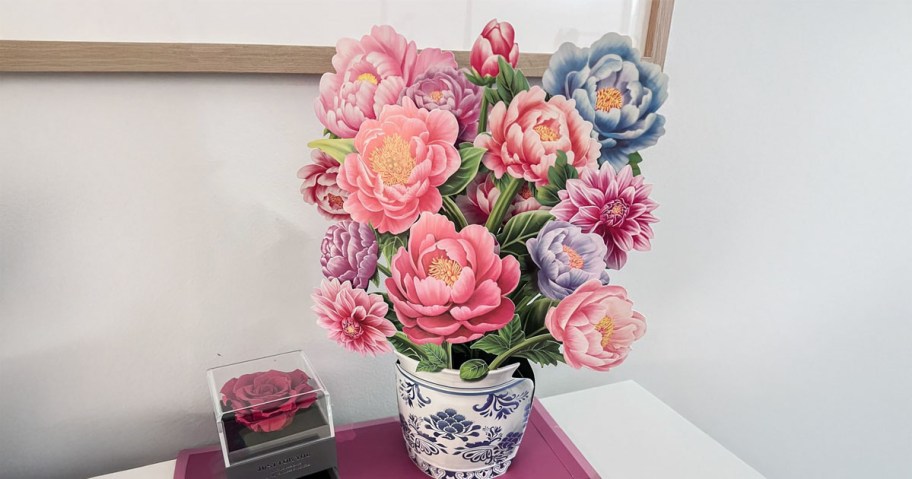 Peony Pop Up Flowers Card on a desk