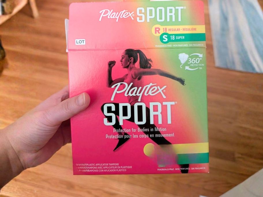 hand holding box of Playtex Sport Tampons