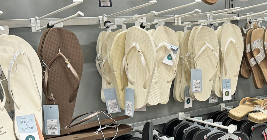 women's flip flops on display in target store