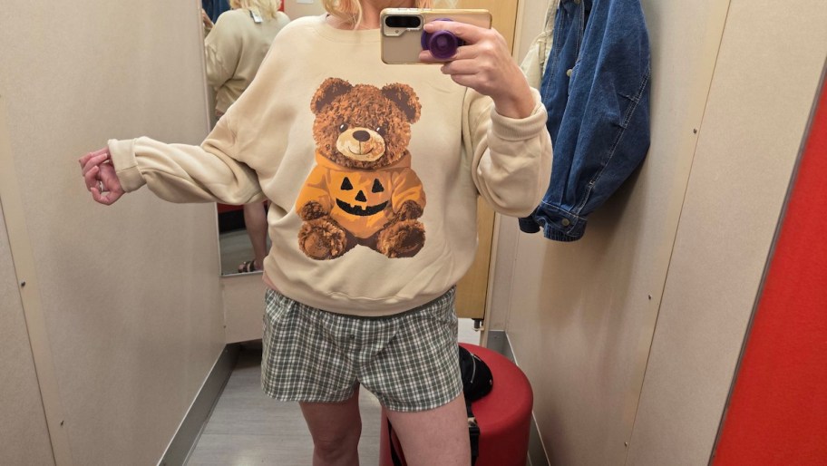 woman modeling Teddy Bear Pumpkin Graphic Sweatshirt