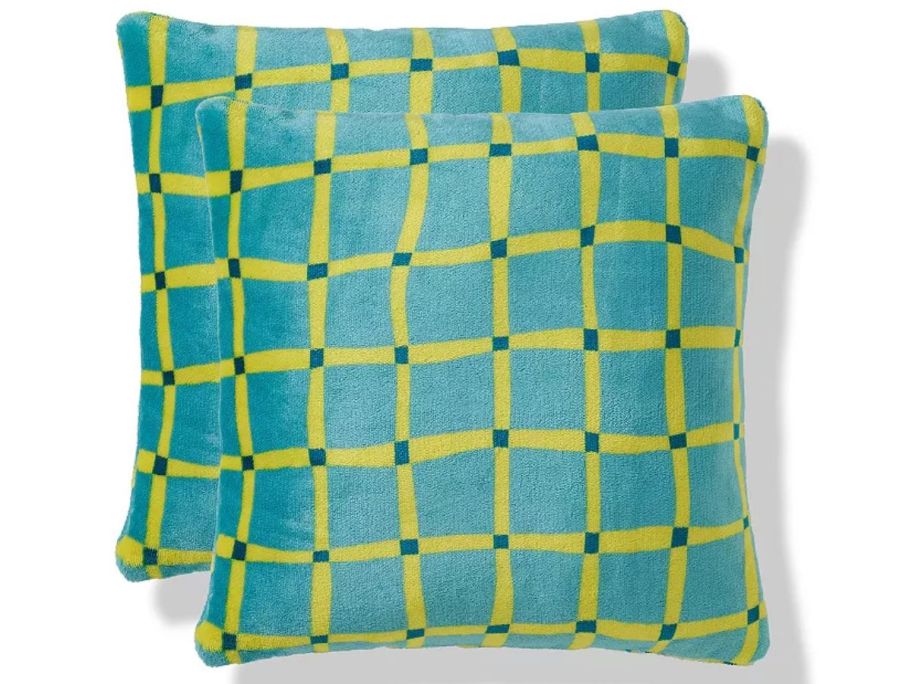2 pillows with green and blue squares on them