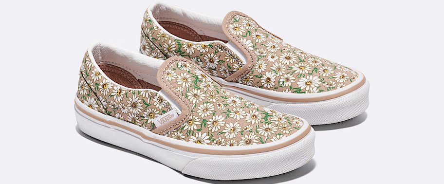 pair of pink floral print slip on shoes