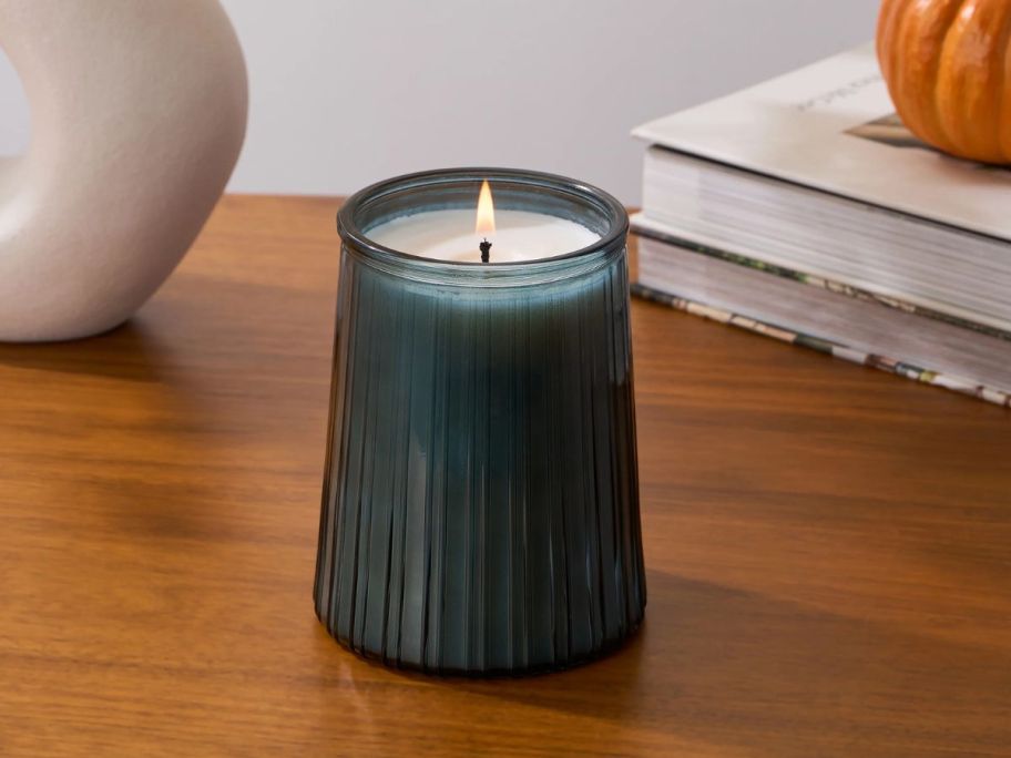 Better Homes & Gardens Oceanside Flannel Jar Candle on table