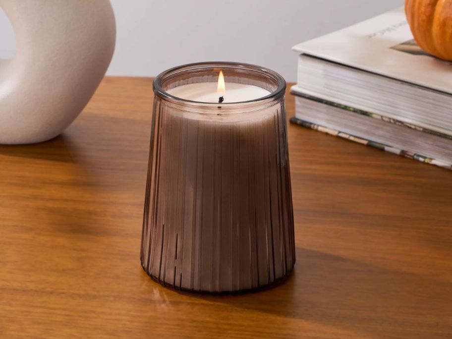 Better Homes & Gardens Salted Coconut Mahogany Jar Candle on table