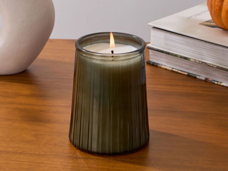 Better Homes & Gardens Noble Fir & Pine Jar Candle on table