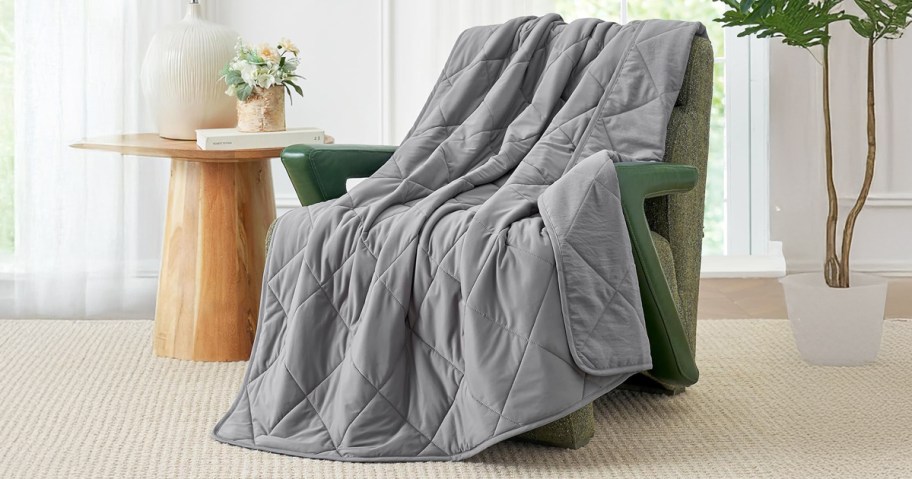 grey cooling blanket on a chair in a living area