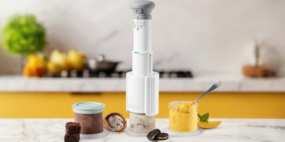 cuisinart frozen treat maker with pints of ice cream on counter