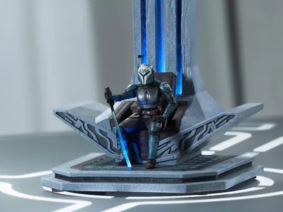 star wars figurine on a gray background