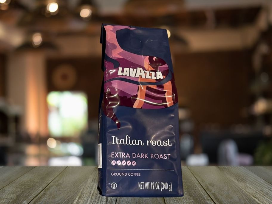 Lavazza Italian Roast Ground Coffee 12oz Bag on table