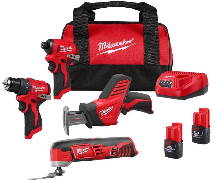 a milwaukee tools 4 tool combo kit with batteeries, charge and bag
