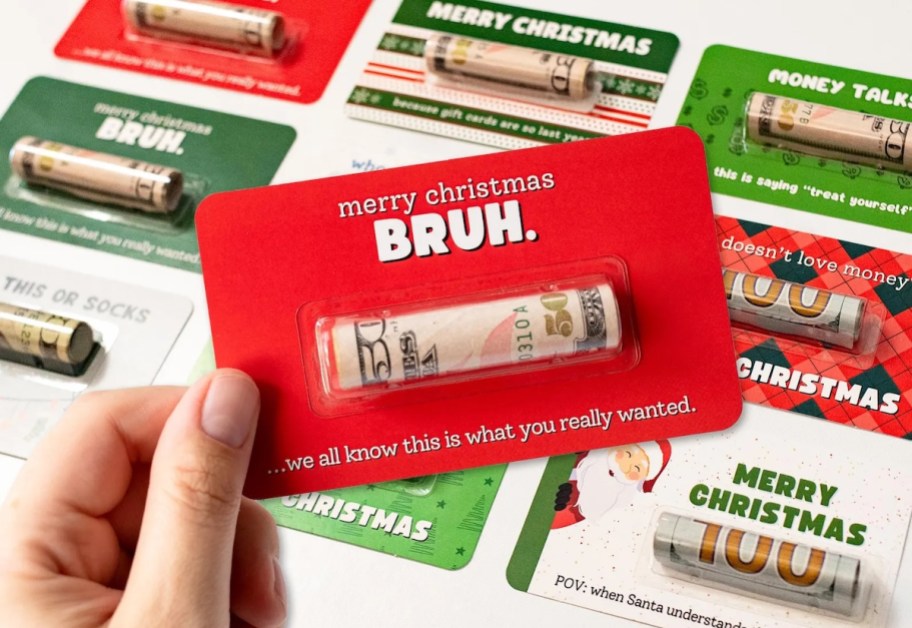 hand holding a money holder bruh card