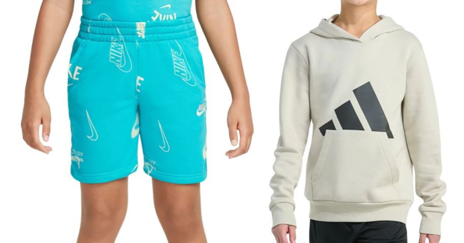 two boys wearing nike and adidas shorts and sweatshirt