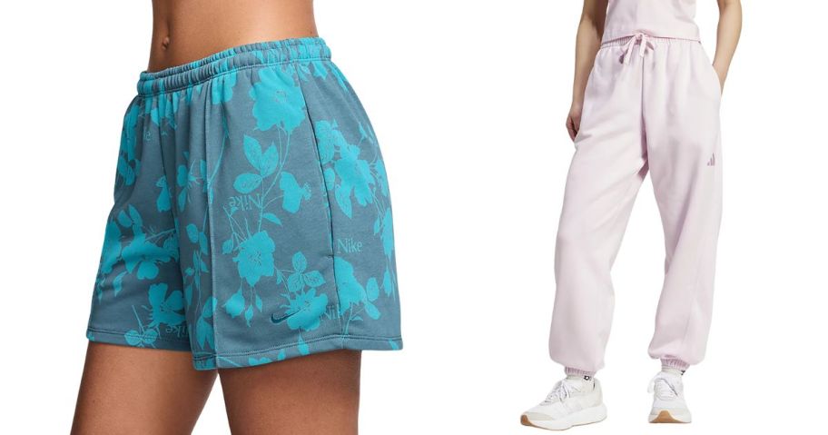 two women wearing nike shorts and adidas sweatpants