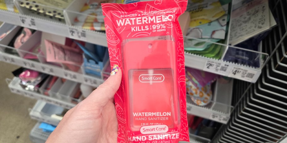 hand holding watermelon hand sanitizer