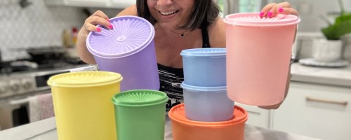 woman behind a set of colorful Tupperware containers