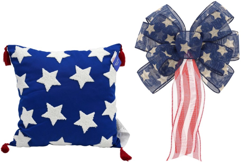Blue pillow with white stars and red tassels alongside a bow with star pattern and red-striped tails.