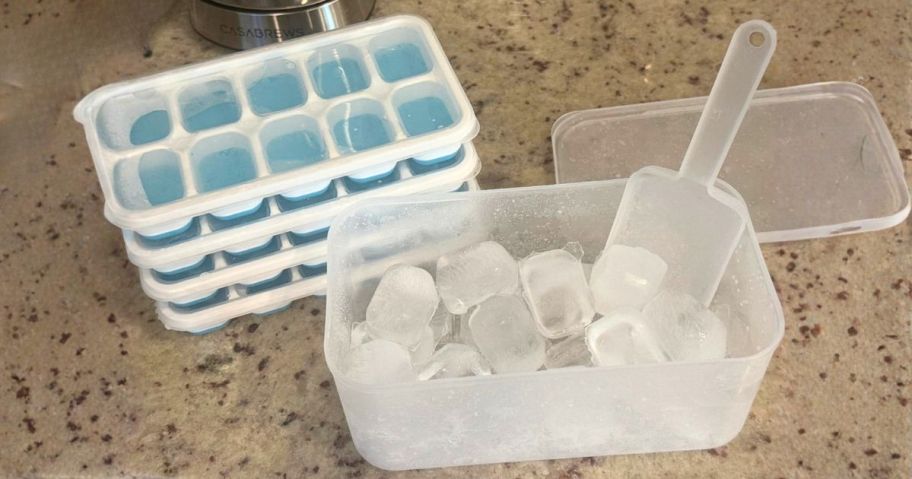 DOQAUS Ice Cube Tray in Blue w/ Lid, Bin, and scoop on counter