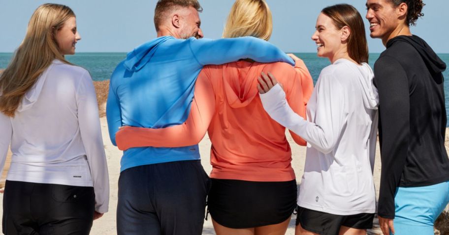 3 women and two men walking together wearing free country clothing