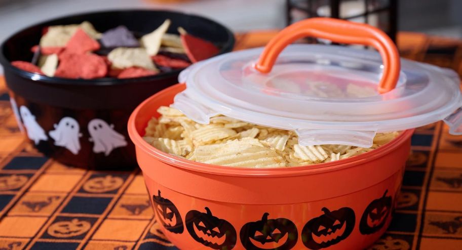 two halloween sets with lids and chips inside